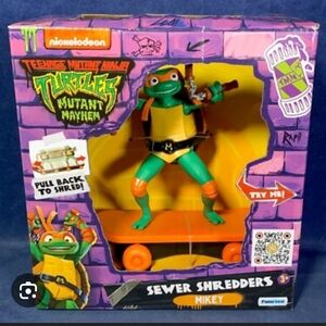 BRAND NEW...   Teenage Mutant Ninja Turtles Sewer Shredders Mikey Action Figure